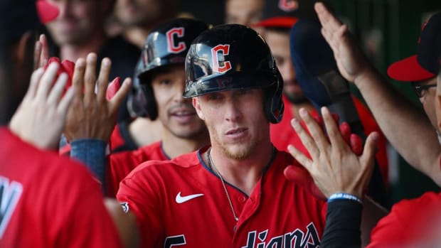 Sep 19, 2022; Cleveland, Ohio, USA; Cleveland Guardians center fielder Myles Straw, front, and left fielder Steven Kwan celebrates after scoring during the sixth inning against the Minnesota Twins at Progressive Field. Mandatory Credit: Ken Blaze-USA TODAY Sports